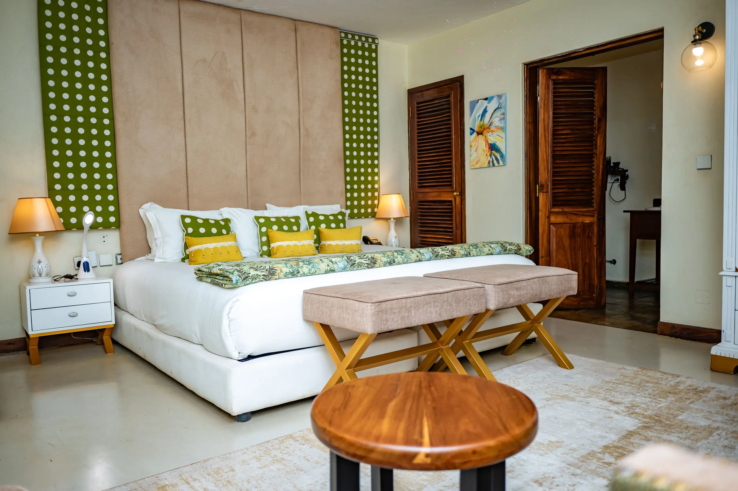 VIP Suite at The Emin Pasha Hotel & Spa, the bed with a bench seat and the dressing room beyond