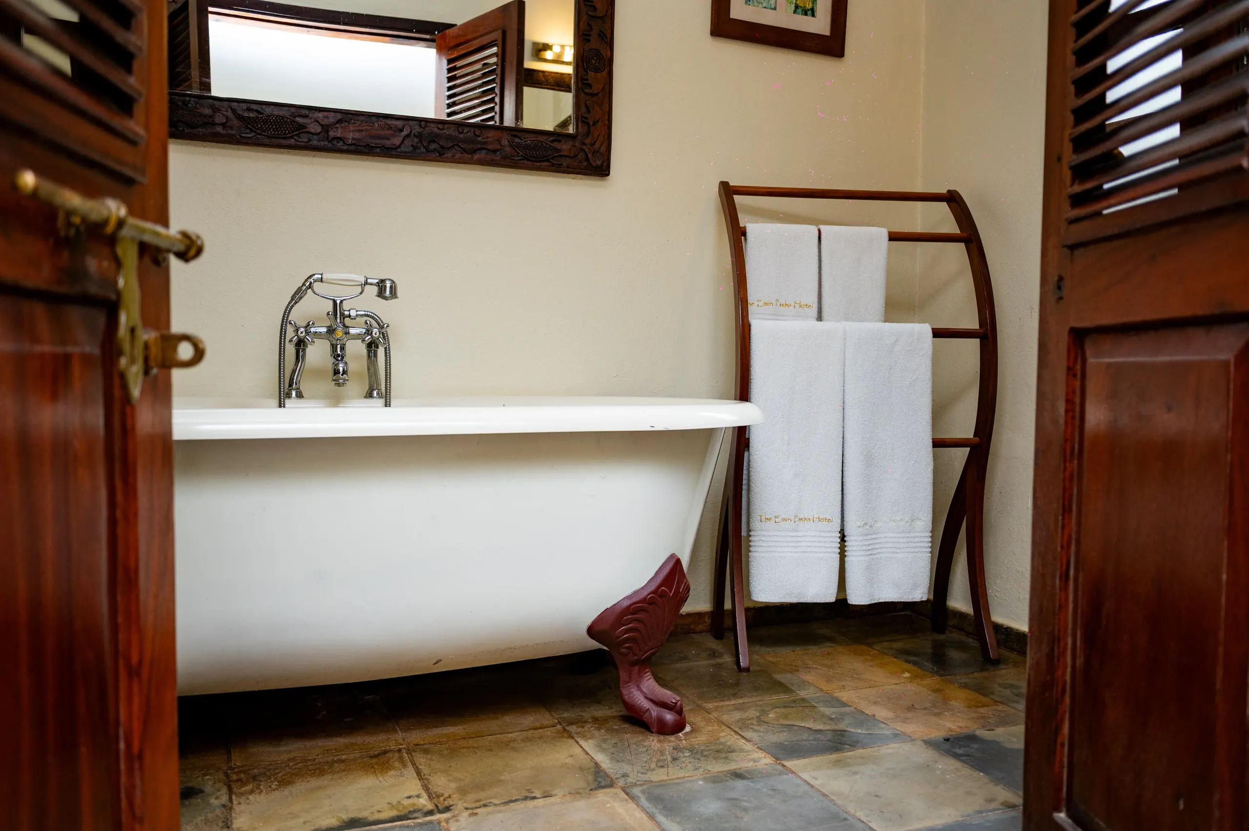 The roll-top bath and towel rail in a Deluxe Suite at The Emin Pasha Hotel & Spa