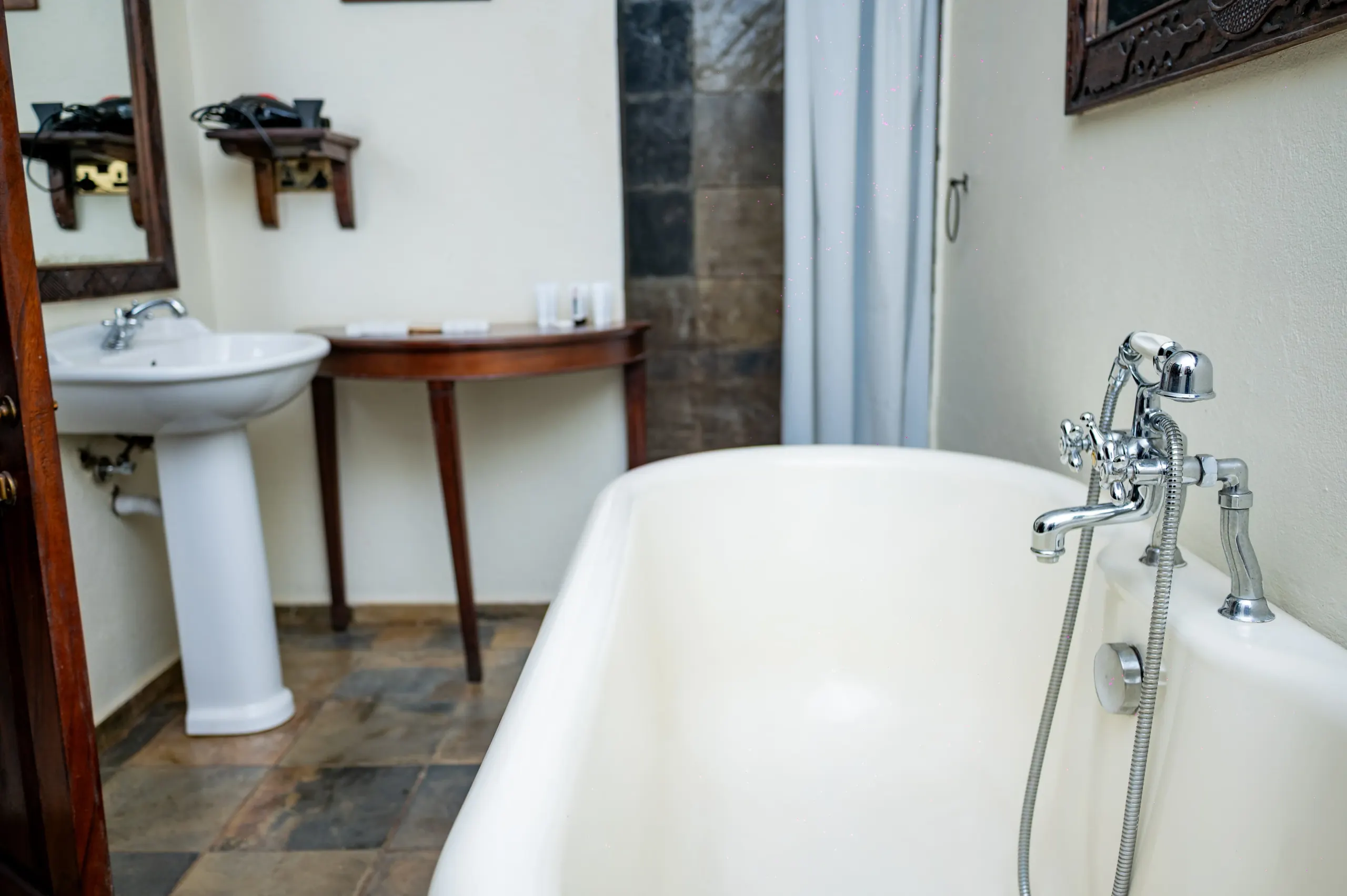 The pedestal basin beside the bath in a Deluxe Suite at The Emin Pasha Hotel & Spa