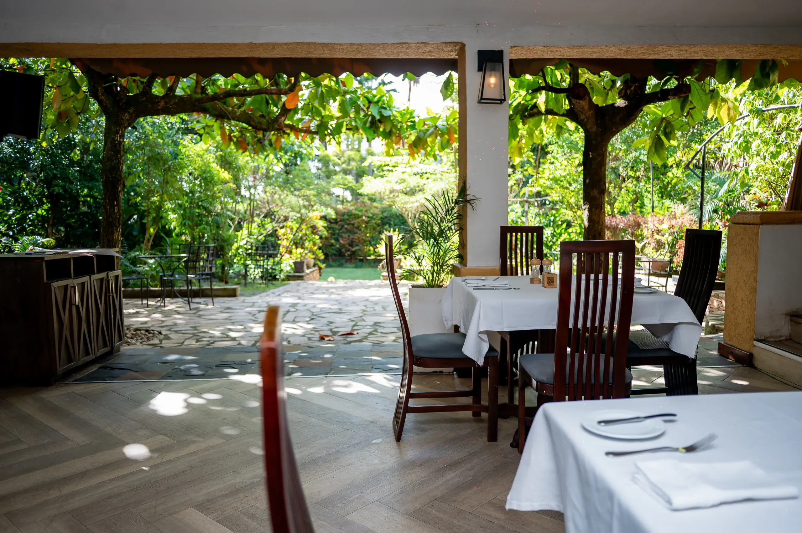 Through Equatoria's open colonnade to the garden terrace