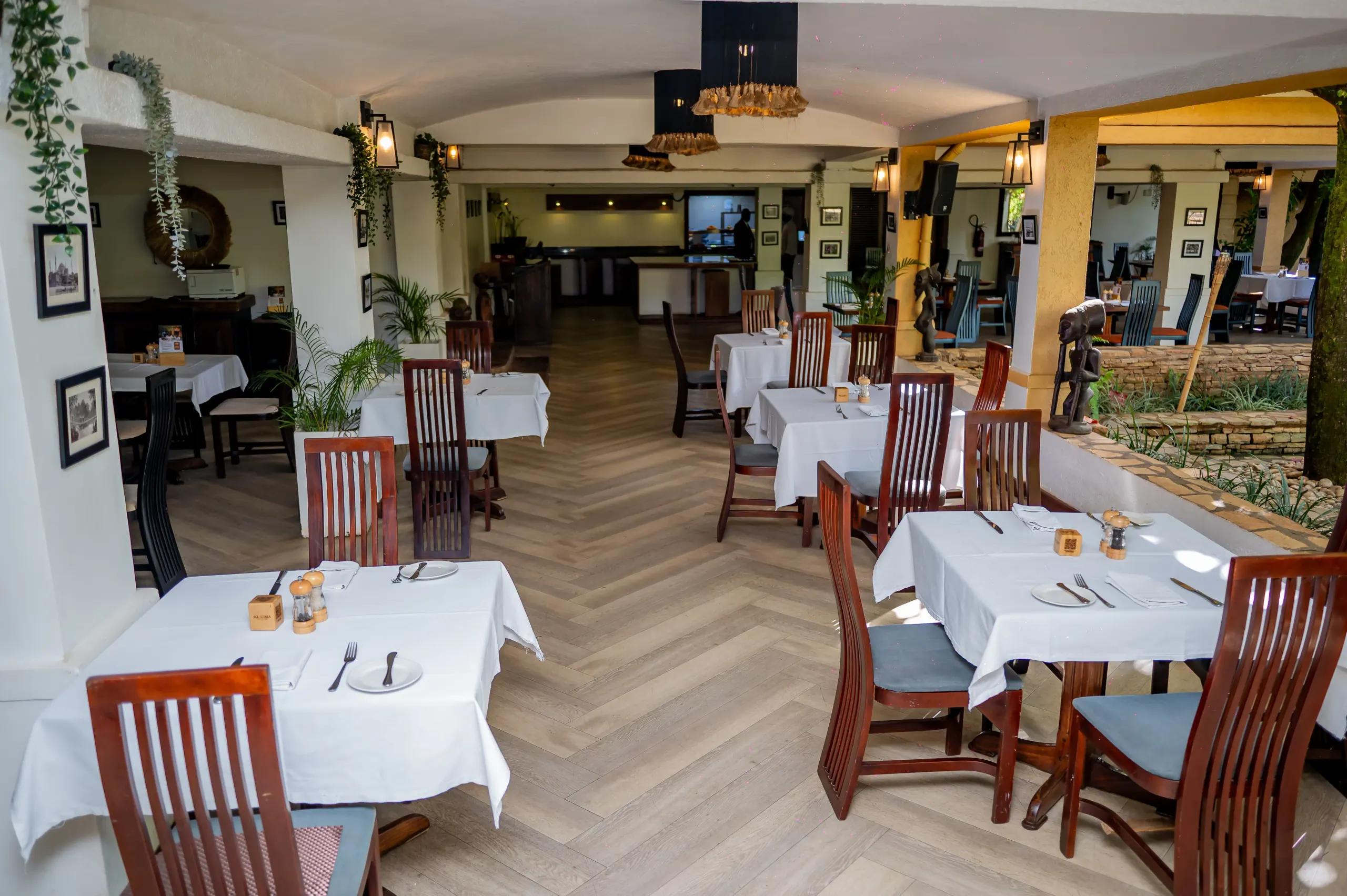 Equatoria's dining room from the far corner, planting to one side