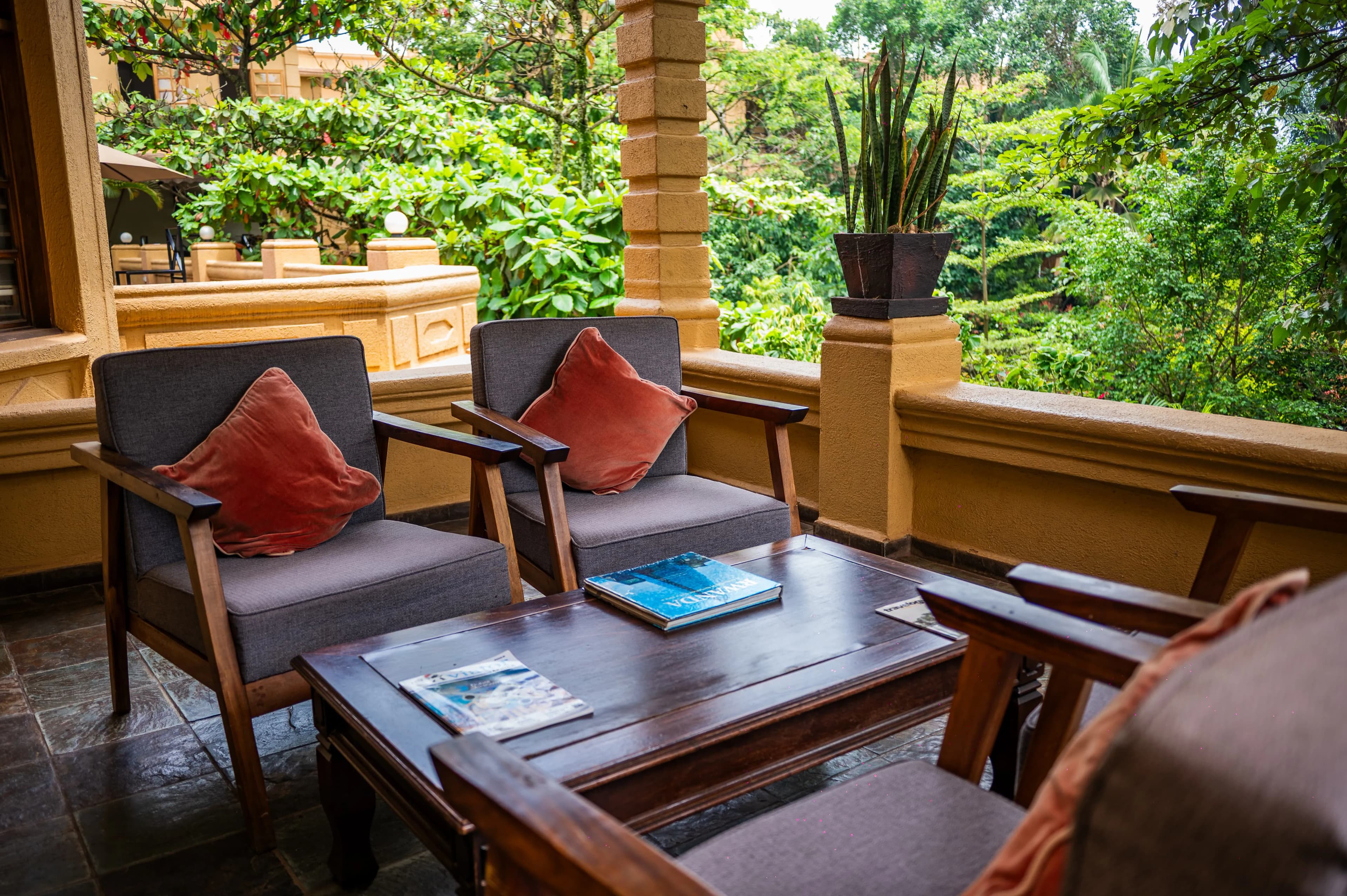 Two armchairs and a low table in a discreet lounge alcove