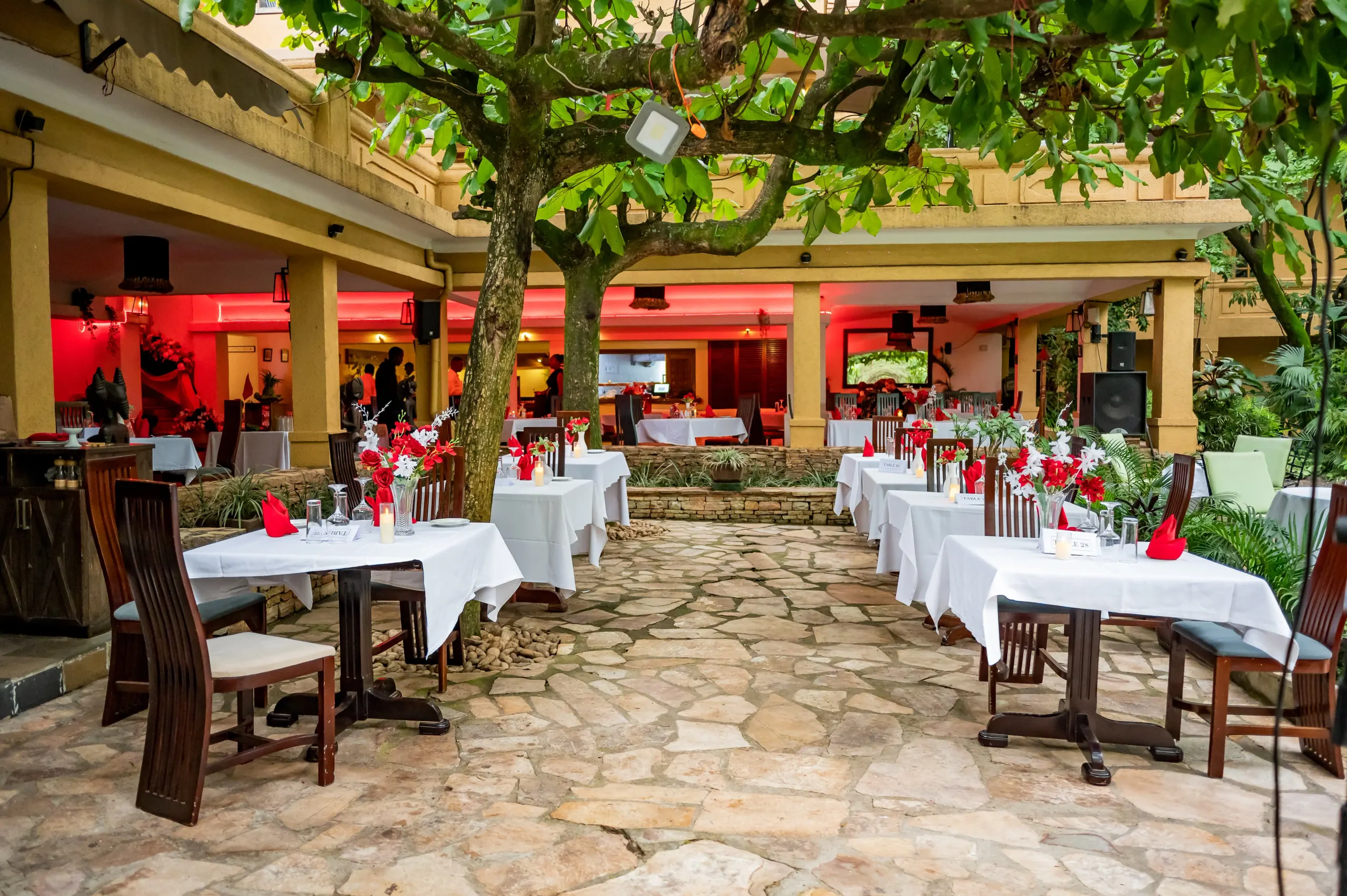 The courtyard restaurant with its tree at the centre