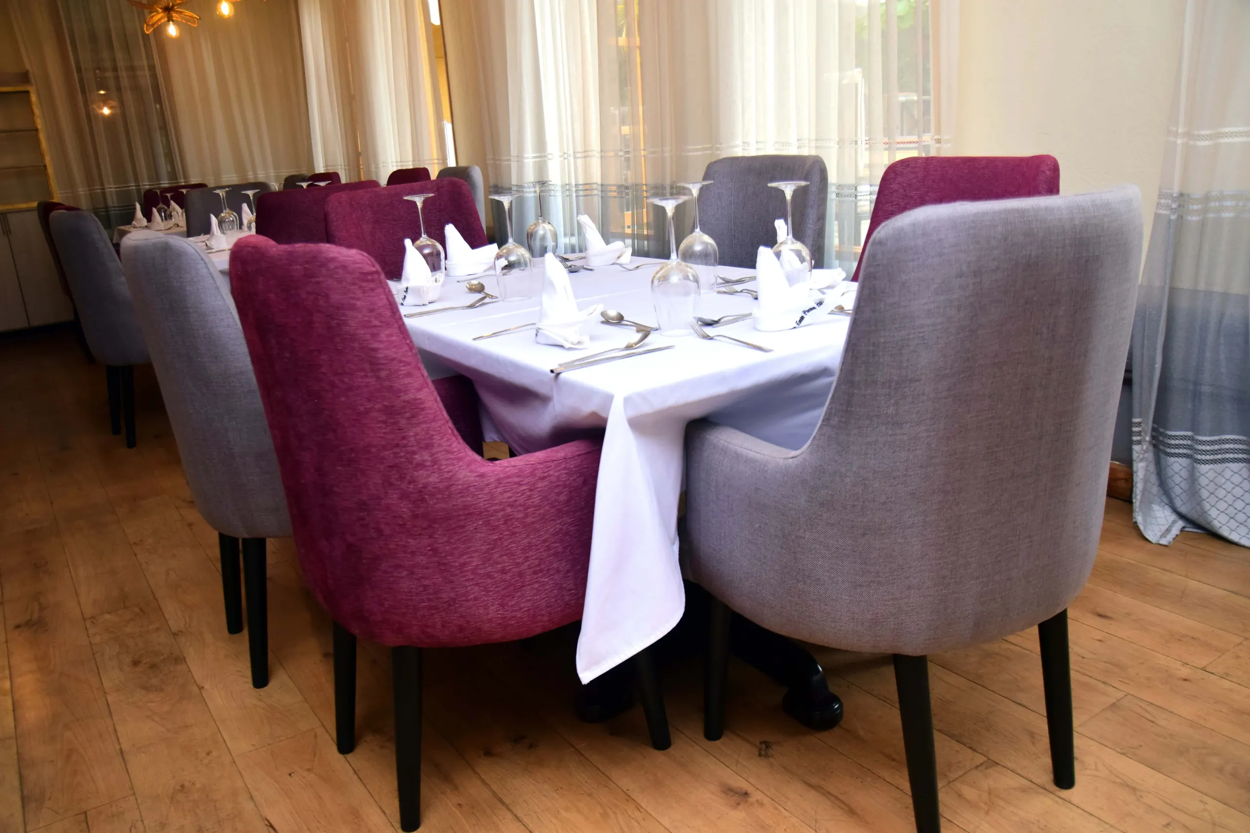 A private dining room laid for a board dinner